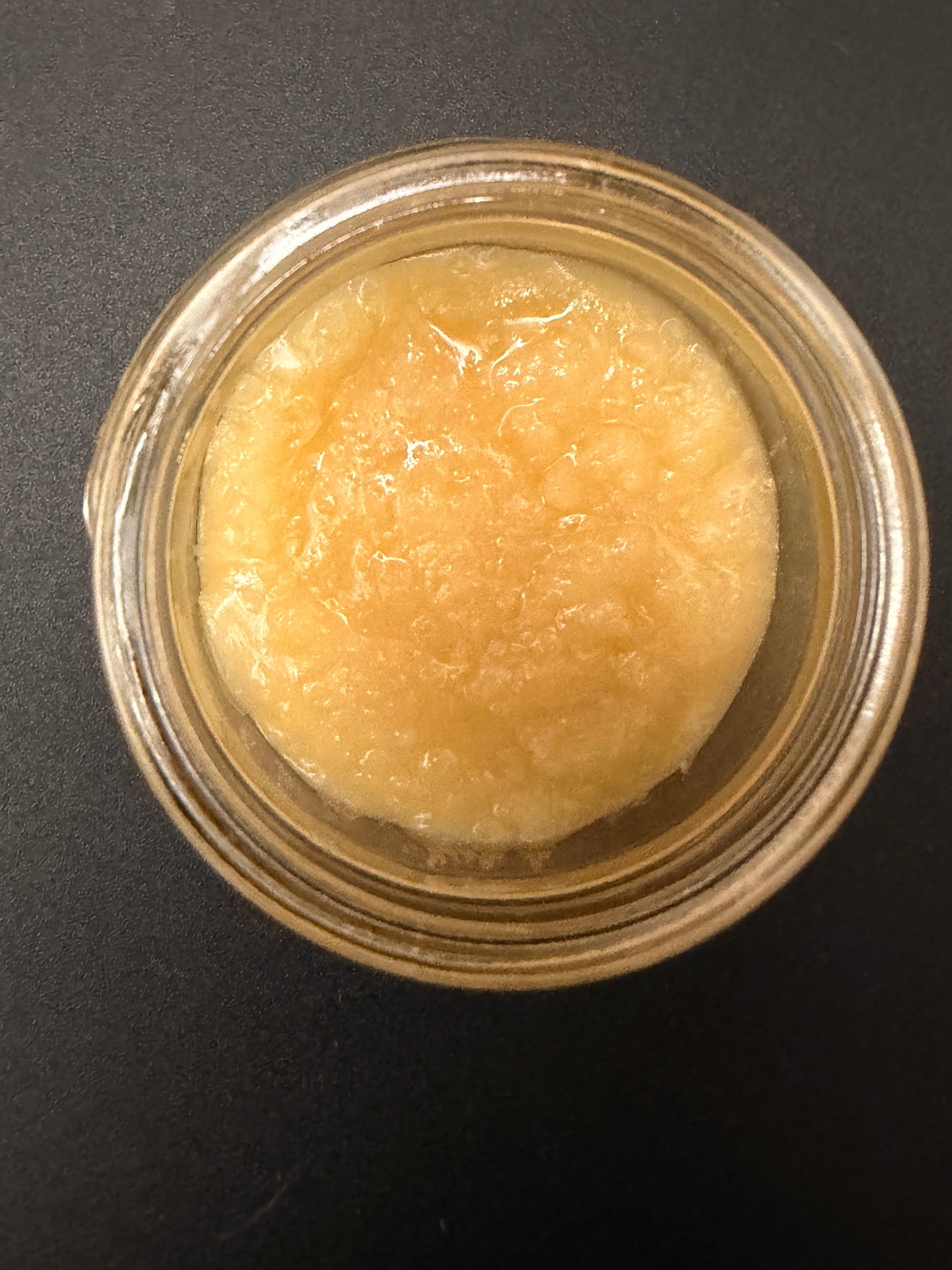 Sour Tangie THCA Cured Resin in a 1g jar